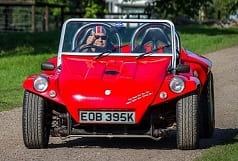 Red vw beach buggy image.
